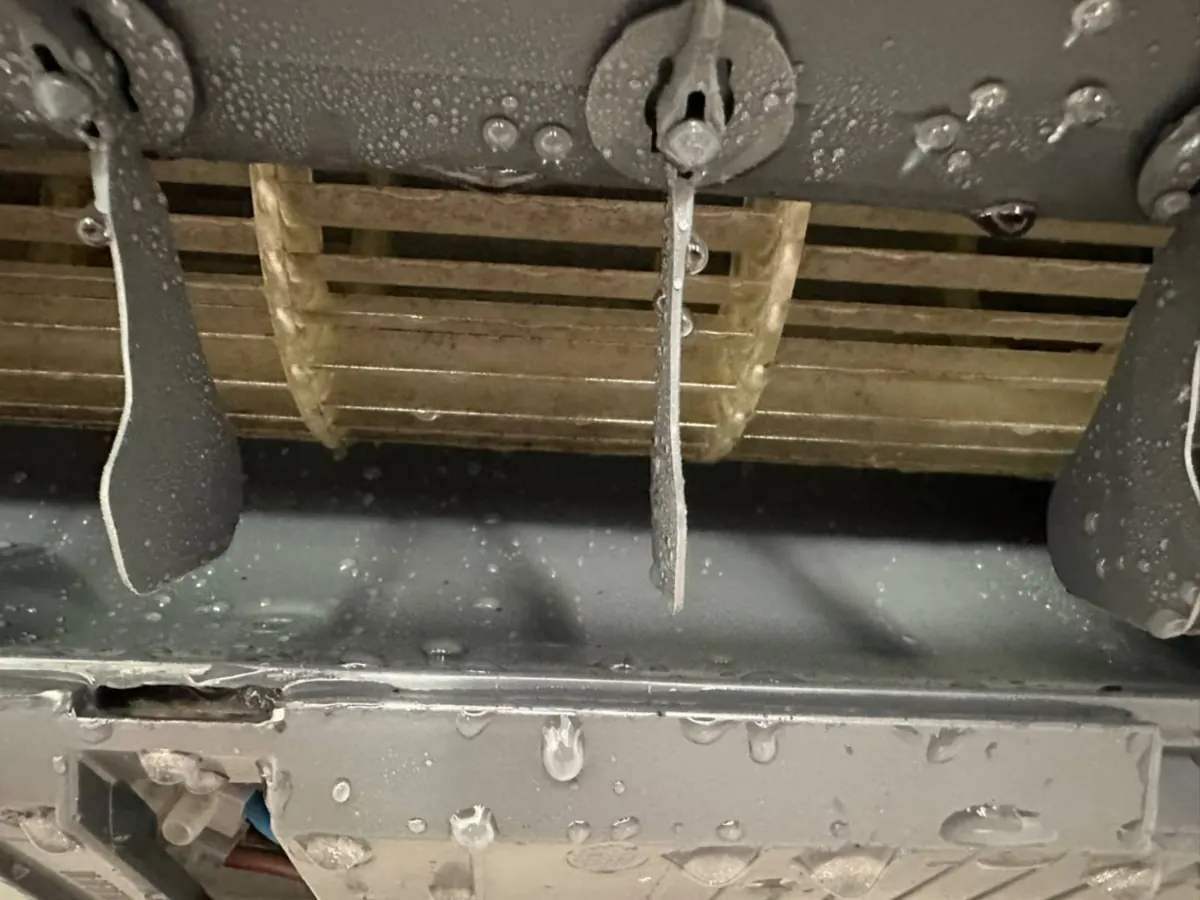 The same blower wheel after cleaning, blades free of dust