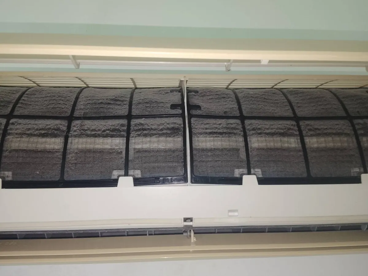 Aircon air filters clogged with dust
